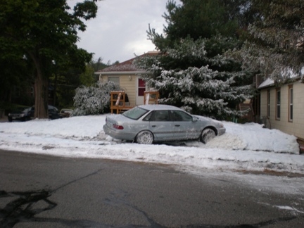 car crashes into snow bank with fake snow blankets