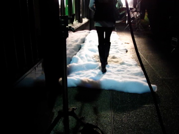 model walking on snow blankets