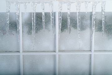 icicles outside a window